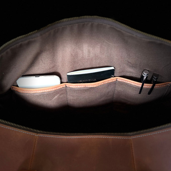 inside pocket of Ode Federation leather weekender bag