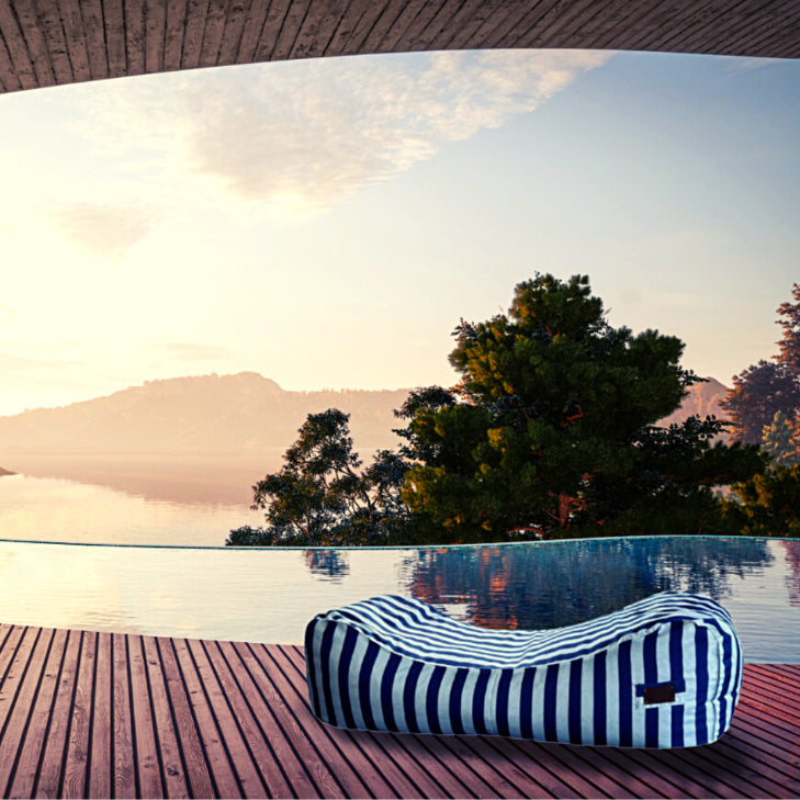 outdoor bean bag sun lounger on a wooden deck