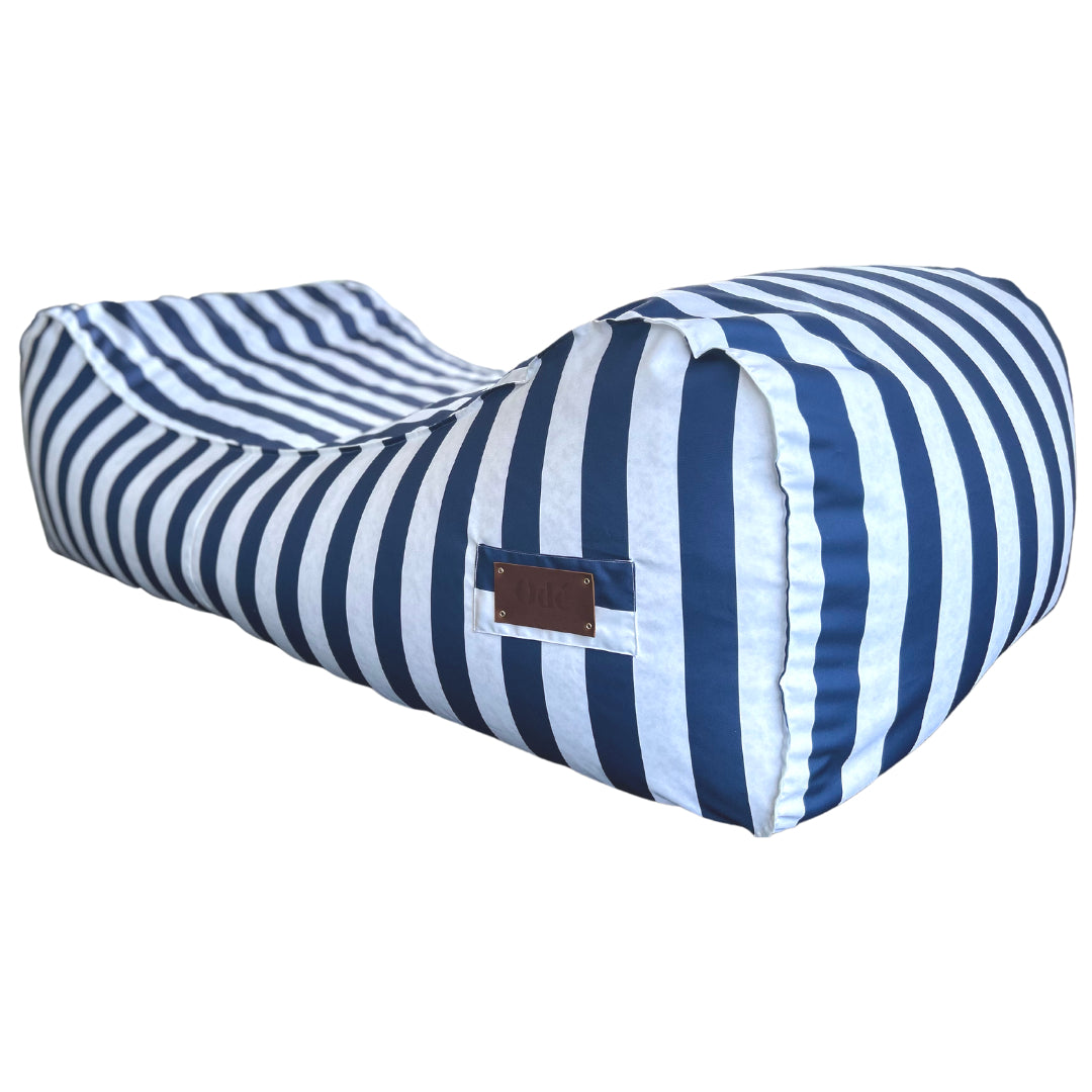 side view of the blue and white striped outdoor bean bag sun lounger